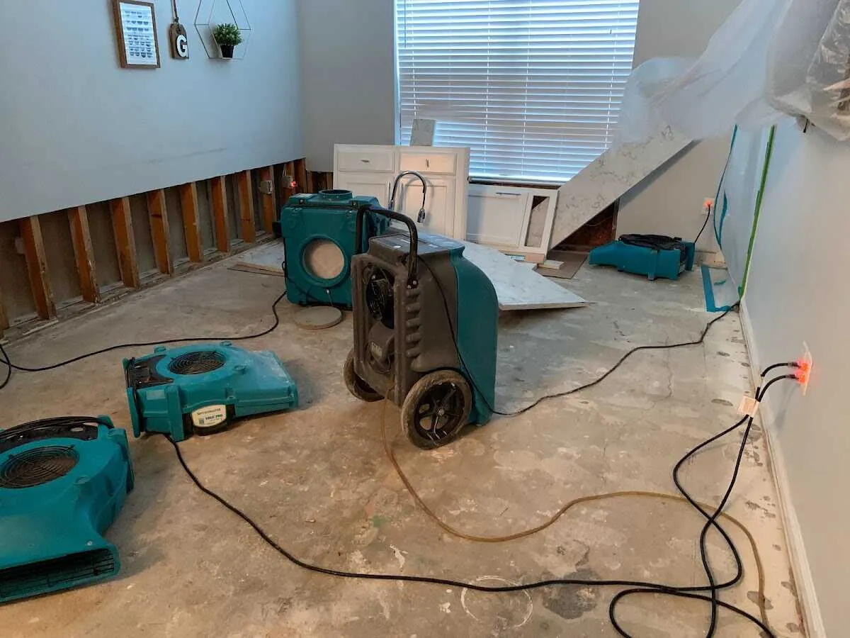 Dehumidifier in flood-cut room for Water Damage Restoration in Liberty Lake